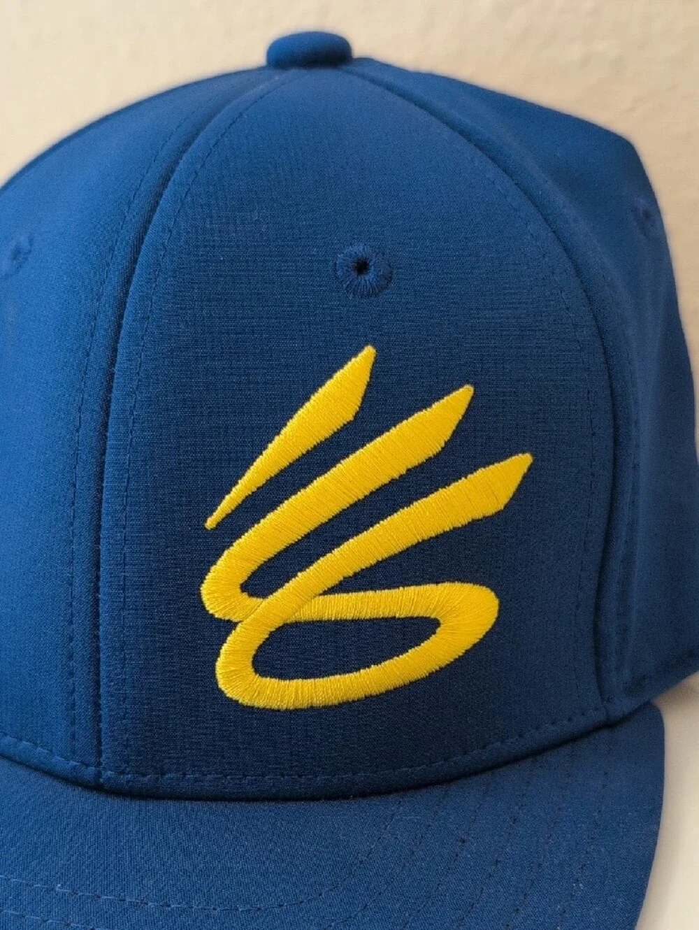Stephen Curry Under Armour Youth OSFM Blue Snapback Hat Yellow Logo NBA Warriors